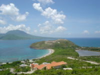 View of Nevis. Salt pond at right.