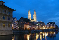 The Grossmünster cathedral and waterfront in modern day Zürich.