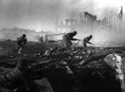 Soviet soldiers fighting in the ruins of Stalingrad, 1942, the bloodiest battle in human history and a major turning point in World War II. The Soviet Union lost around 27 million people during the war, almost half of all World War II casualties.