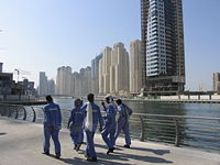 Dubai has approximately 250,000 labourers, mostly South Asian, working on real estate development projects such as the Dubai Marina.