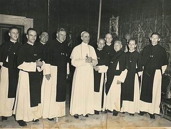 To maintain contacts with local clergymen and Catholic communities, the popes grant private audiences as well as public ones. Here the Canons Regular of the Holy Cross from Uden (Netherlands) are received by Pope Pius XII.