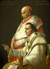 Pope Pius VII, bishop of Rome, next to Cardinal Caprara. The Pope wears the pallium, a liturgical vestment that is used heraldically at the foot of the coat of arms of Benedict XVI.