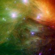 A Spitzer image of the Pleiades in infrared light, showing the associated dust.  Credit: NASA/JPL-Caltech