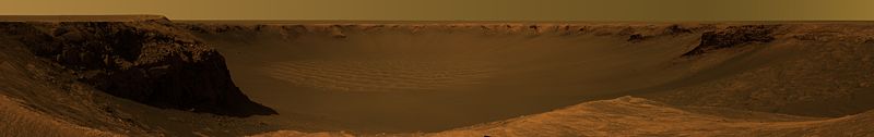 This approximate true-color image, taken by the Mars Exploration Rover Opportunity, shows the view of  Victoria Crater from Cape Verde.  It was captured over a three-week period, from October 16 – November 6, 2006.