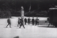 Hitler (hand on side) staring at Foch's statue before signing the armistice at Compiègne, France (22 June 1940)