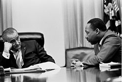 President Johnson meets with Civil Rights leader Martin Luther King in the White House Cabinet Room in 1966.