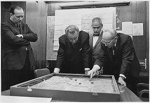 Walt Whitman Rostow showing President Lyndon B. Johnson a model of the Khe Sanh area in February 1968