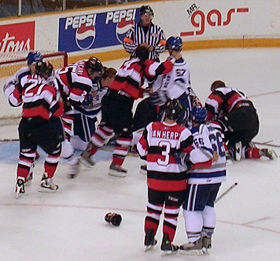 Altercations often occur near the goal after a stoppage of play, since defensive players are extremely concerned with protecting their goaltender.  All rulebooks call for penalties if an offensive player interferes with a goaltender's ability to defend the goal.