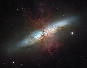 M82, the archetype starburst galaxy, has experienced a 10-fold increase in star formation rate as compared to a "normal" galaxy.   Credit:Hubble Space TelescopeNASA/ESA//STScI.