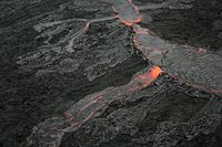 Pāhoehoe Lava flow at Hawaii (island). The picture shows few overflows of a main lava channel.