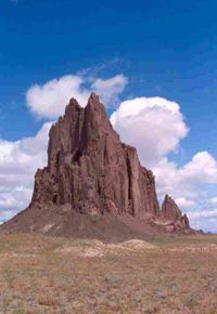 Shiprock, the erosional remnant of the throat of an extinct volcano.