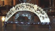 An elaborately carved ivory decoration