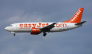 An EasyJet Boeing 737-300 landing at Madrid Barajas International Airport