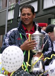 Michael Campbell holding U.S. Open Trophy