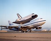Boeing 747 Shuttle Carrier Aircraft lifts off with Endeavour from Edwards AFB in May 2001.