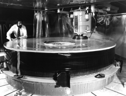 Polishing of Hubble's primary mirror begins at Perkin-Elmer corporation, Danbury, Connecticut, May 1979. The engineer pictured is Dr. Martin Yellin, an optical engineer working for Perkin-Elmer on the project.
