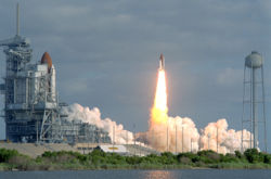 Shuttle mission STS-31 lifts off, carrying Hubble into orbit.