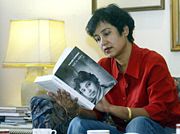 A reader reading a book (Taslima Nasrin reading her book)