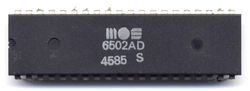 MOS 6502 microprocessor in a dual in-line package, an extremely popular 8-bit design.