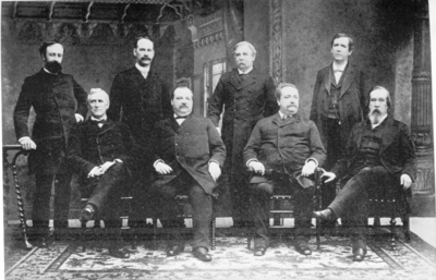 Cleveland's first cabinet. Front row, left to right: Thomas F. Bayard, Cleveland, Daniel Manning, Lucius Q. C. Lamar  Back row, left to right: William F. Vilas, William C. Whitney, William C. Endicott, Augustus H. Garland