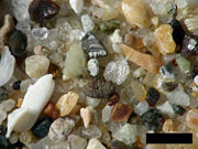 Sand from Pismo Beach, California. Components are primarily quartz, chert, igneous rock and shell fragments. Scale bar is 1.0 mm.