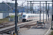 At 300 km/h, an ICE 3 (DB class 403) releases sand from several bogies to the rails.