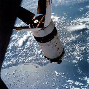 The S-IVB stage from the Apollo 7 flight in Earth orbit. Although Apollo 7 used a Saturn IB booster, the S-IVB stage was used on both the Saturn IB and Saturn V. On Saturn V flights the four Spacecraft/LM Adapter panels would be jettisoned to allow access to the Lunar Module