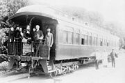 Henry Stanley and party standing on the back of an observation car at Monterey, California, March 19, 1891.