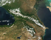 Satellite image of Caucasus Mountains, Black Sea (l.) and Caspian Sea (r.)