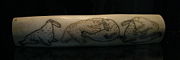 Walrus tusk engraving made by Chukchi artisans depicting polar bears attacking walruses. On display in the Magadan Regional Museum, Magadan, Russia.