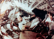 In-flight footage of the crew taken while they were in orbit around the Moon; Frank Borman is in the center