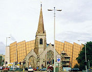 The ruined Charles Church, the city's memorial to the civilians killed in the Blitz and Drake Circus Shopping Centre behind