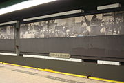 Subway station Nieuwmarkt with historic images of the Nieuwmarktrellen