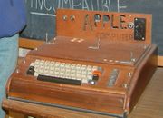 The Apple I, Apple's first product. Sold as an assembled circuit board, it lacked basic features such as a keyboard, monitor, and case. The owner of this unit added a keyboard and a wooden case.