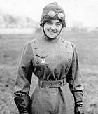 The aviator Matilde Moisant (1878–1964) wearing a swastika medallion in 1912. The symbol was popular as a good luck charm with early aviators.