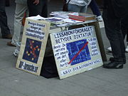 Members of the LaRouche movement in Stockholm protest the Treaty of Lisbon with pictures rearranging the stars of the Flag of Europe into a swastika.
