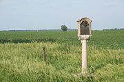 In the 1920s, historical markers were placed at the county lines along the route Lincoln traveled in the eighth judicial district. This example is on the border of Piatt and DeWitt counties.