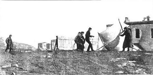 Marconi watching associates raise kite antenna at St. John's, December, 1901
