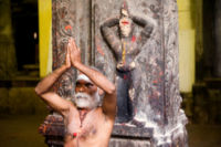 A sadhu performing namaste in Madurai, India.
