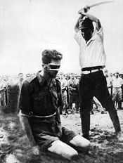 Aitape, New Guinea, 1943. An Australian soldier, Sgt Leonard Siffleet, about to be beheaded with a katana sword. Many Allied prisoners of war (POWs) were summarily executed by Japanese forces during the Pacific War. Executioner Yasuno Chikao, later captured and sentenced to hanging, had his sentence commuted to 10 years imprisonment.