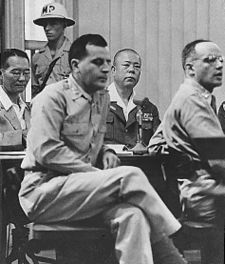 General Tomoyuki Yamashita (second right) was tried in Manila between October 29 and December 7, 1945, by a U.S. military commission, on charges relating to the Manila Massacre and earlier occurrences in Singapore, and was sentenced to death. The case set a precedent regarding the responsibility of commanders for war crimes, and is known as the Yamashita Standard. The legitimacy of the hasty trial has been called into question.