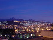 In the background are the volcanoes Cotopaxi, Pasochoa and Rumiñahui.