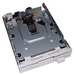 The 3½-inch floppy disk drive automatically engages when the user inserts a disk, and disengages and ejects with the press of the eject button. On Macintoshes with built-in floppy drives, the disk is ejected by a motor (similar to a VCR) instead of manually; there is no eject button. The disk's desktop icon is dragged onto the Trash icon to eject a disk.
