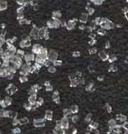 Magnified crystals of refined sugar.
