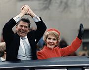 The Reagans wave from the limousine taking them down Pennsylvania Avenue to the White House, right after the president's inauguration