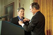 Former President Ronald Reagan returns to the White House to receive the Presidential Medal of Freedom from President George H.W. Bush in 1993