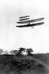 Wright Flyer III piloted by Orville over Huffman Prairie, 4 October 1905. Flight #46, covering 20 and 3/4 miles in 33 minutes 17 seconds; last photographed flight of the year.