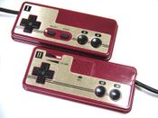 Unlike the NES, the Famicom's controllers were hardwired to the system itself. The 2nd controller eliminated the Start and Select buttons, replacing it with a microphone and a volume control slider.