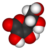 Model of a vitamin C molecule. Black is carbon, red is oxygen, and white is hydrogen