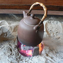 Korean tea kettle over hot coal